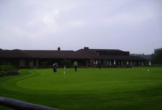 Woburn Golf Club clubhouse and practice green, Buckinghamshire, England