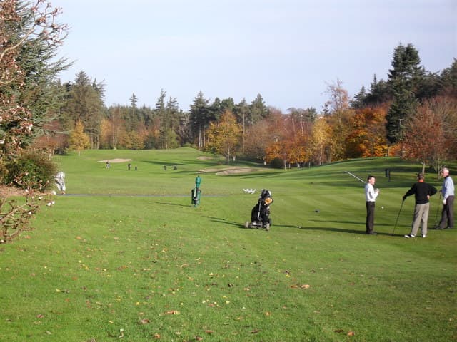 Teeing off on the first hole at Druids Glen Golf Resort, County Wicklow, Ireland