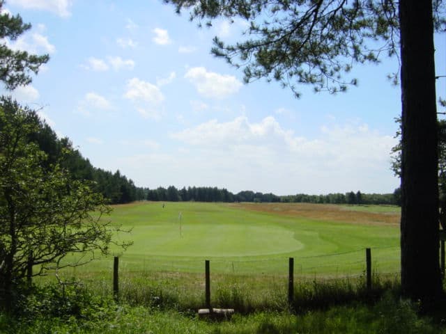 Formby Golf Club green seen from the Woodland Path, Merseyside, England